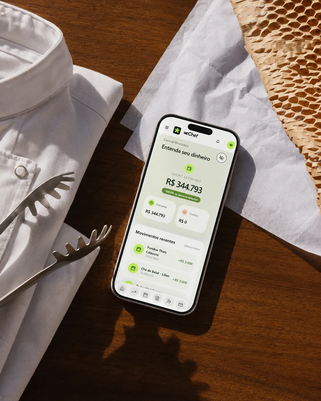 Painel financeiro da weChef aberto no celular durante a operação